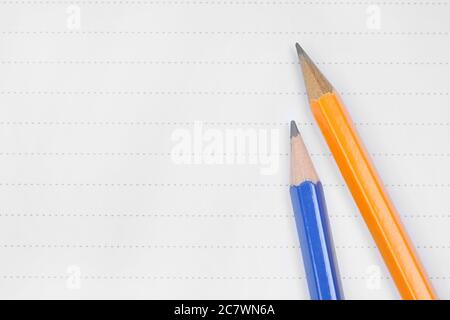 Pencils on a empty page close-up Stock Photo