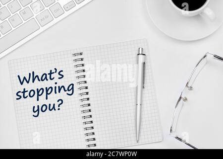 Question What's stopping you on notebook page close-up Stock Photo