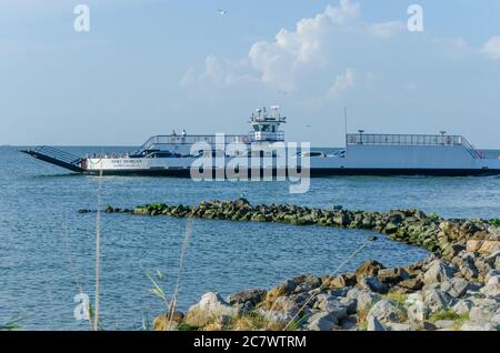 The Mobile Bay Ferry returns to Dauphin Island from Gulf Shores and Fort Morgan, June 30, 2020, in Dauphin Island, Alabama. Stock Photo