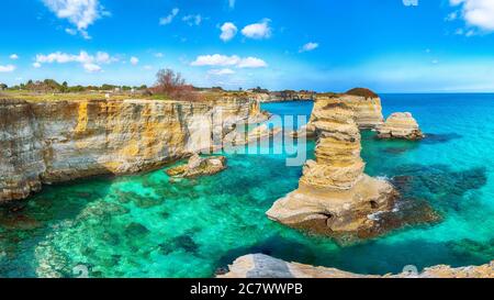 Picturesque seascape with cliffs, rocky arch at Torre Sant Andrea, Salento coast, Puglia region, Italy Stock Photo