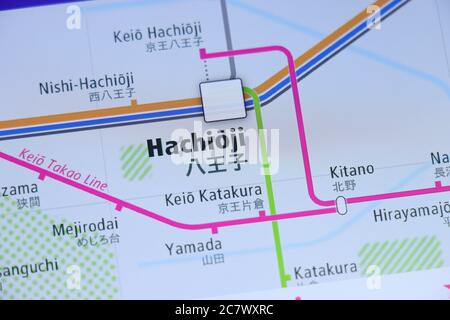 Hachioji Station on Tokyo subway map on smartphone screen. Stock Photo