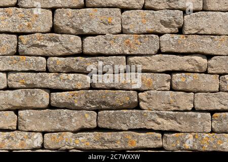 Closeup shot of an English wall made of rectangular stones Stock Photo