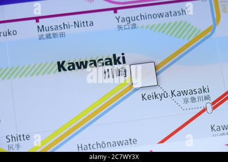 Kawasaki Station on Tokyo subway map on smartphone screen. Stock Photo