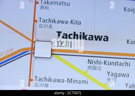 Tachikawa station on Tokyo subway map on smartphone screen. Stock Photo