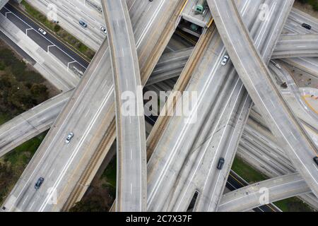 Aerial of Los Angeles 110 and 105 freeway interchange ramps and bridges ...