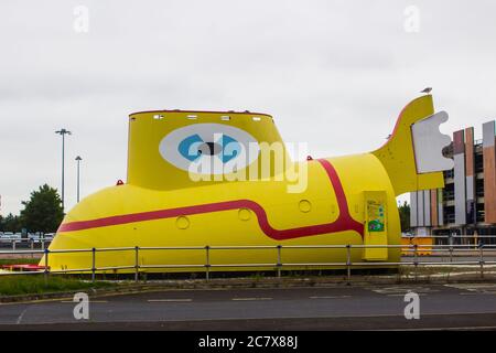 8 july 2020 The famous life size sculpture of the Yellow Submarine so called after the Beatles song and now located at the John Lennon Airport entranc Stock Photo