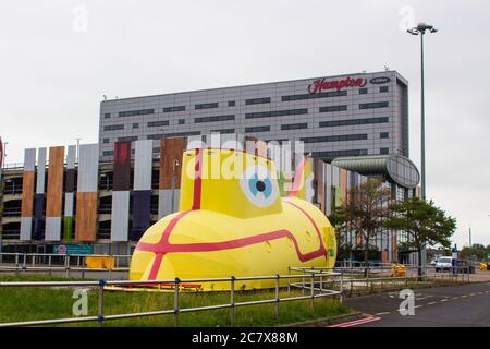 8 july 2020 The famous life size sculpture of the Yellow Submarine so called after the famous Beatles song and now located at the John Lennon Airport Stock Photo