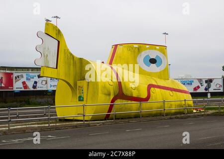 8 july 2020 The famous life size sculpture of the Yellow Submarine so called after the famous Beatles song and now located at the John Lennon Airport Stock Photo