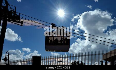 Cable Cars Crossing Montmorency Falls Under Sun Stock Photo