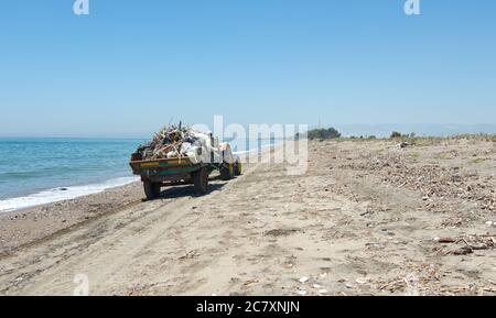 Special truck for collecting waste from the beach Stock Photo