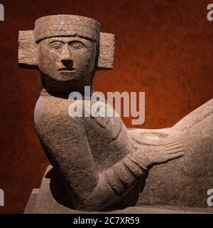 A Chac Mool sculpture of the Maya civilization with scale where hearts of human sacrifices were placed, Mexico City, Mexico. Stock Photo