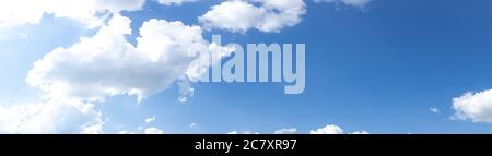 Wide panorama of brilliant blue sky with white clouds, creative copy space, atmosphere and weather, horizontal aspect Stock Photo