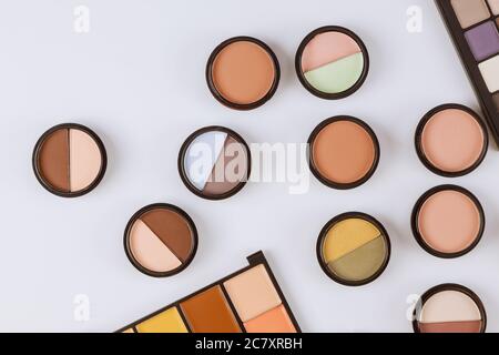Set of eyeshadows in pastel beige colors pallet brown matte shadows, close up of make up product on an isolated white background Stock Photo