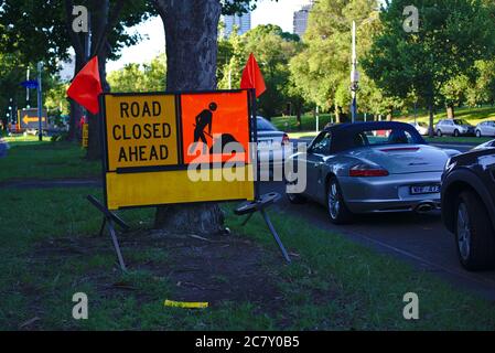 Melbourne, VIC / Australia - Dec 23 2018: road closed ahead warning sign in yellow color Stock Photo