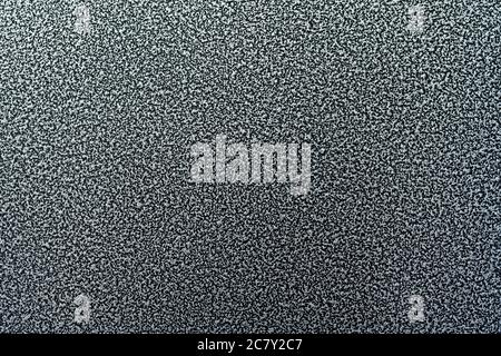 Etched dark metal texture. Abstract black background. Stock Photo