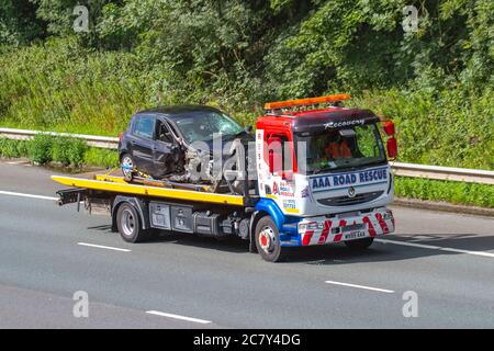 AAA Road Rescue (Leyland).  24 hr accident and breakdown recovery services. Renault Road Rescue,  24 hour roadside breakdown service. Haulage delivery trucks, lorry, transportation, truck, AUTO carrier, Renault  vehicle, European commercial transport, industry, M6 at Manchester, UK Stock Photo