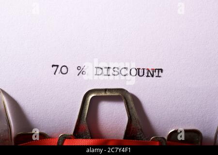 70 % discount text written on a paper. Stock Photo