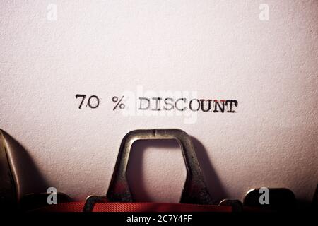 70 % discount text written on a paper. Stock Photo