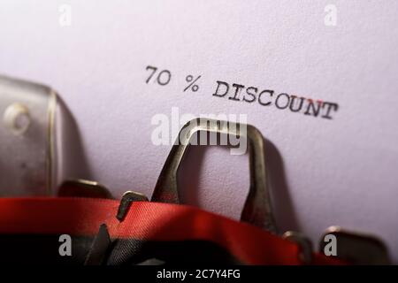 70 % discount text written on a paper. Stock Photo