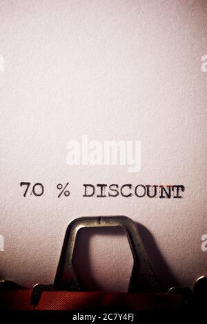 70 % discount text written on a paper. Stock Photo