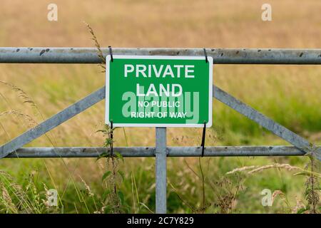 Private Land No Public Right of Way sign on farm gate - England, UK Stock Photo