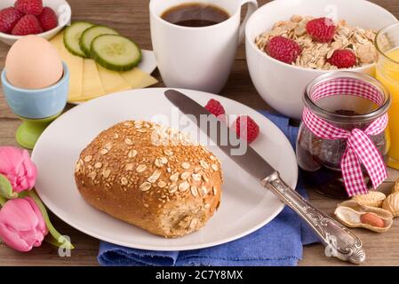 Richly laid breakfast table Stock Photo