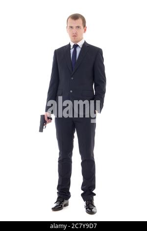full length portrait of man in business suit with gun isolated on white background Stock Photo