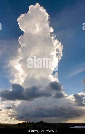 Dramatic cloud - Cumulonimbus thunder cloud over South Plaza Island in The  Galapagos Islands, Ecuador Stock Photo - Alamy