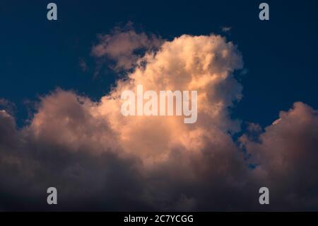Blue sky with white little clouds or colorful dramatic clouds. Stock Photo