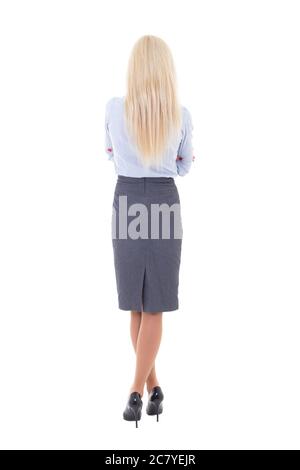 back view of young beautiful woman in business suit isolated on white background Stock Photo
