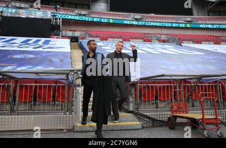 Wembley, UK. 19th July, 2020. Ashley Cole and Gary Lineker after working for BBC Match of The Day at the Emirates FA Cup Semi-Final match Chelsea v Manchester United, at Wembley Stadium, London, UK on July 19, 2020. The match is being played behind closed doors because of the current COVID-19 Coronavirus pandemic, and government social distancing/lockdown restrictions. Credit: Paul Marriott/Alamy Live News Stock Photo