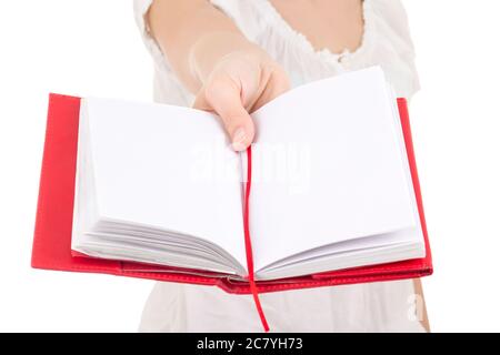 woman giving blank notebook isolated on white background Stock Photo