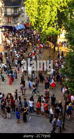 BLOIS, FRANCE - JULY 15, 2018: Happy fans celebrating at streets after French football team won the final game at of World Cup 2018 Stock Photo