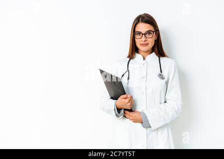 Beautiful female doctor smiling isolated on white background