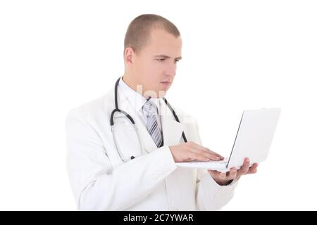 young handsome male doctor using laptop isolated on white background Stock Photo