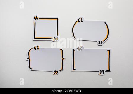 Paper speech bubbles icon on the white Stock Photo