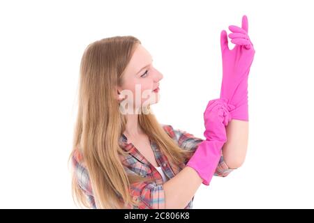 young attractive woman in pink rubber gloves over white Stock Photo