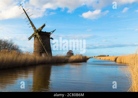 Norfolk windmill, view of an abandoned windmill at Brograve drainage mill sited in a remote area of the Norfolk Broads near Horsey, east Norfolk, UK Stock Photo