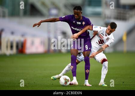 Christian Kouame of ACF Fiorentina and Alex Sandro of Juventus FC compete  for the ball during the Serie A football match between Juventus FC and ACF  Stock Photo - Alamy