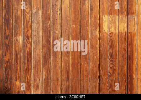 old rustic wood paneling background with vertical wooden boards or planks Stock Photo