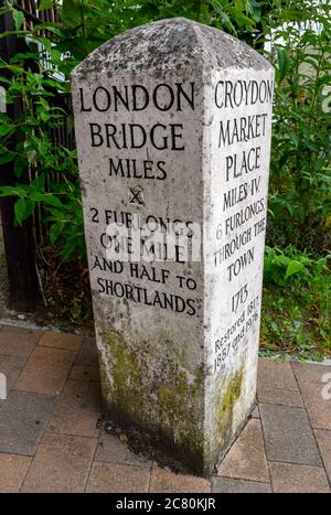 Beckenham (Greater London), Kent, UK. Old milestone at the junction of the High Street and Bromley Road in Beckenham showing distances from Beckenham. Stock Photo