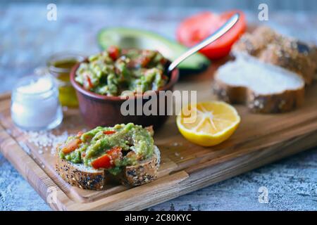 Fresh guacamole. Deep avocado guacamole. Keto diet. Keto snack. Stock Photo