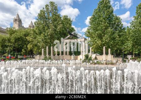 The controversial World War II German occupation memorial on Szabadsag ter in Budapest, Hungary with a fountain before it Stock Photo
