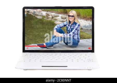 video blog concept - woman talking about something in video on laptop screen isolated on white background Stock Photo