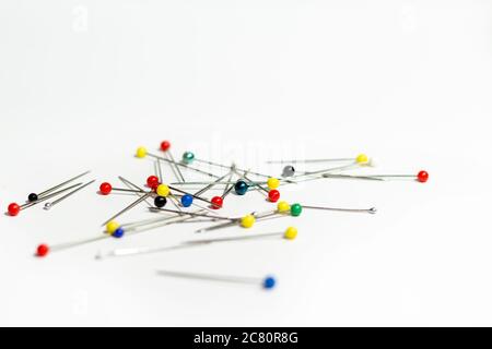 colored ball pins. white background different coloured pins Stock Photo