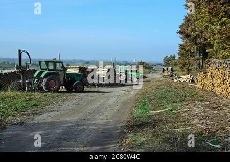 Austria, forest and wood management, tractor with hydraulic wood splitter Stock Photo