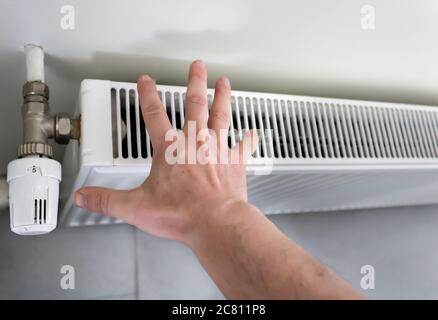 Energy-saving heater set. To save money heater adjustment must be done Stock Photo