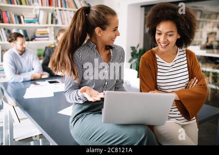 Successful company with happy workers. Business, meeting, office concept Stock Photo