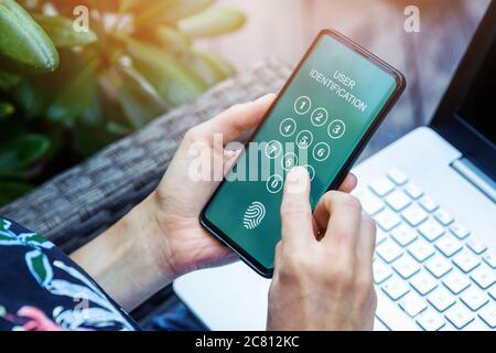electronic payment - entering pin code in mobile app for person identification Stock Photo