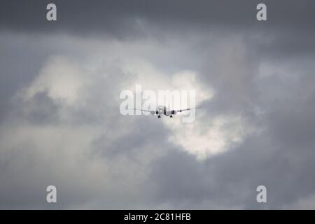 Glasgow, Scotland, UK. 20th July, 2020. Pictured: Emirates flight from Dubai seen landing at Glasgow Airport after the coronavirus lockdown eased. Credit: Colin Fisher/Alamy Live News Stock Photo